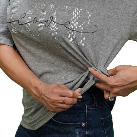 Image of The Cinch It! model showing how to put Cinch It! into  the side of a t-shirt